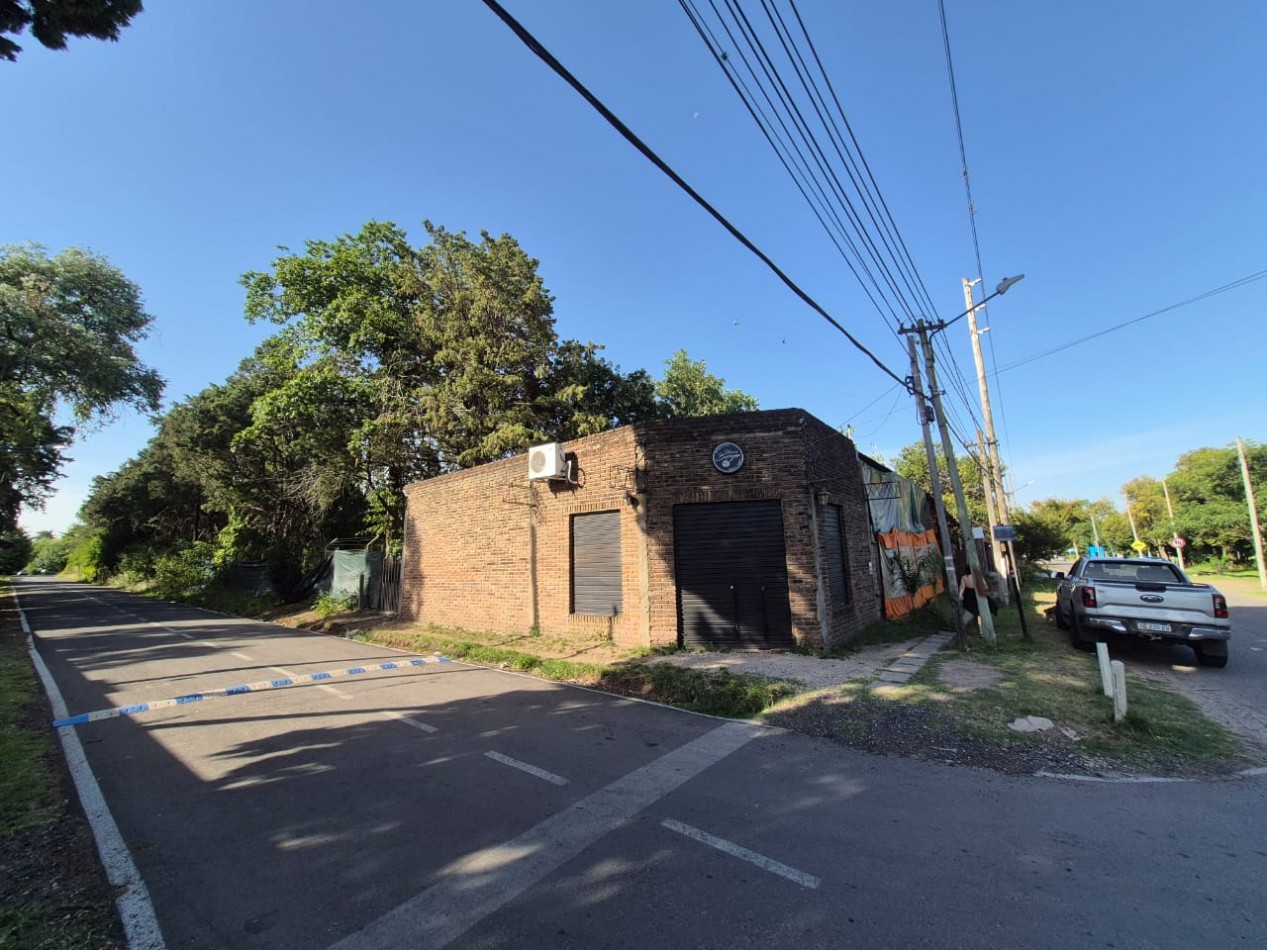 LOTE CON LOCALES EN CENTRO DE MANZANARES - OPORTUNIDAD DE INVERSION